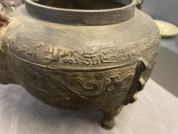 Two Chinese bronze censers, a vase and a mirror, Ming and later